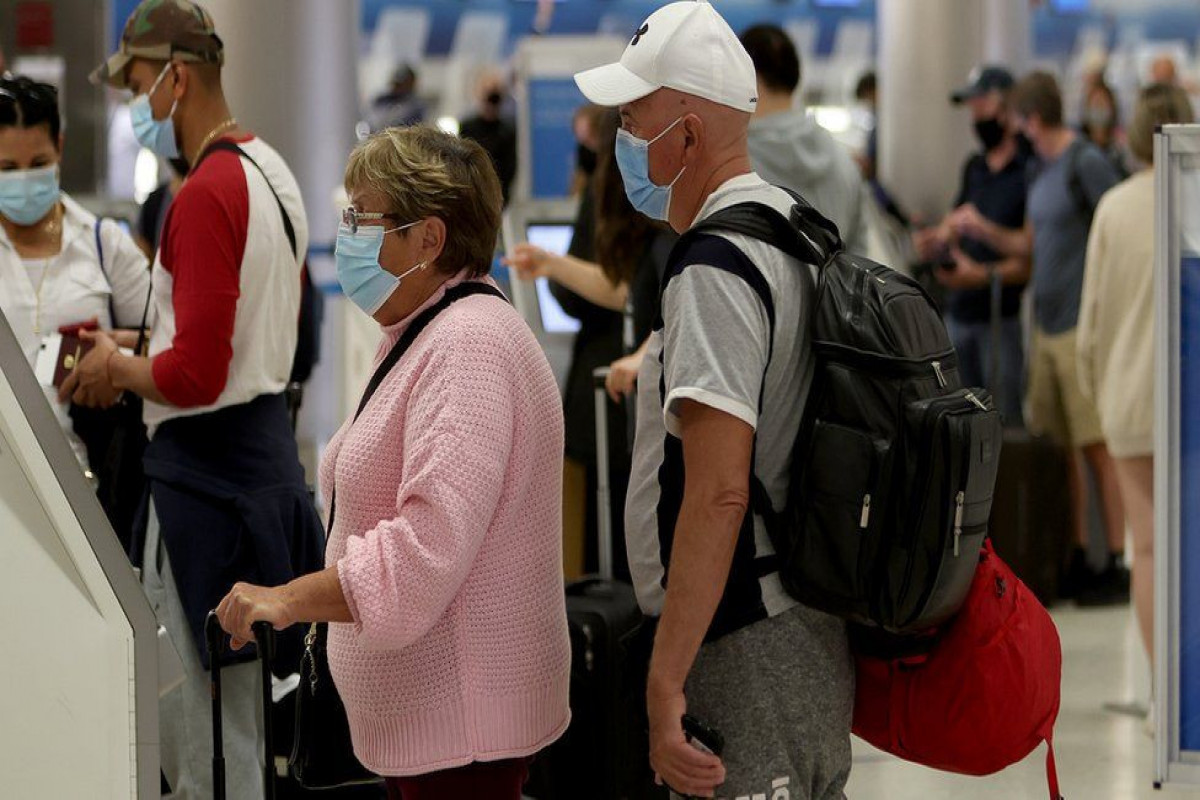 US flight cancellations hit new holiday peak amid Covid and bad weather