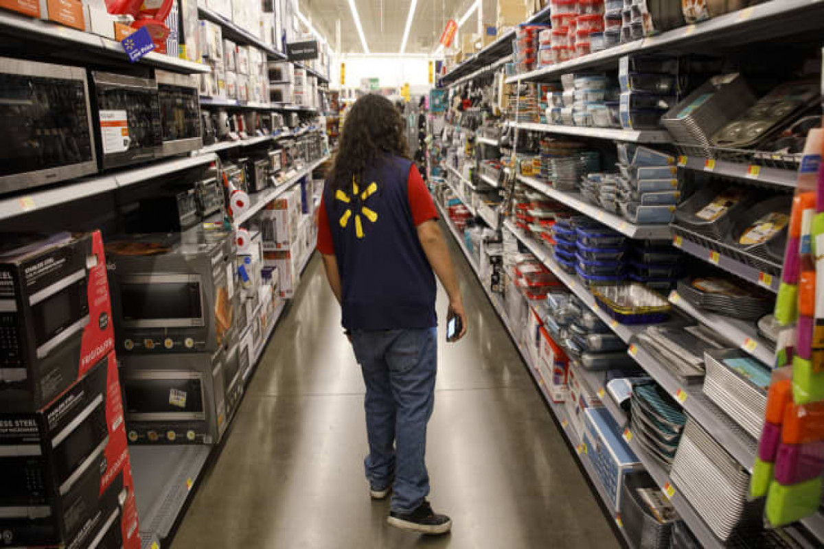 Walmart cuts paid leave in half, as CDC guidance changes