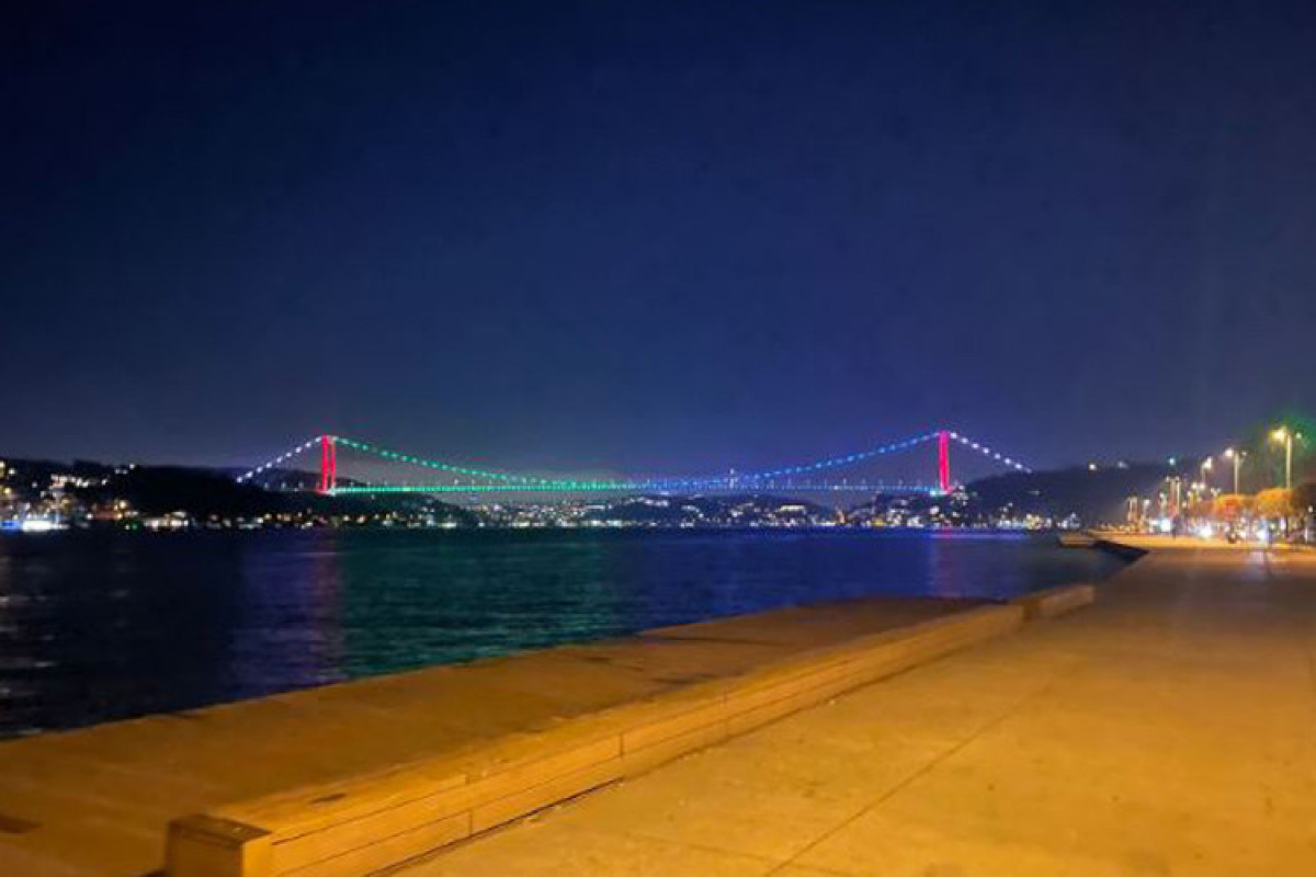 Istanbul's Fatih Sultan Mehmet Bridge is illuminated with the colors of the Azerbaijani flag