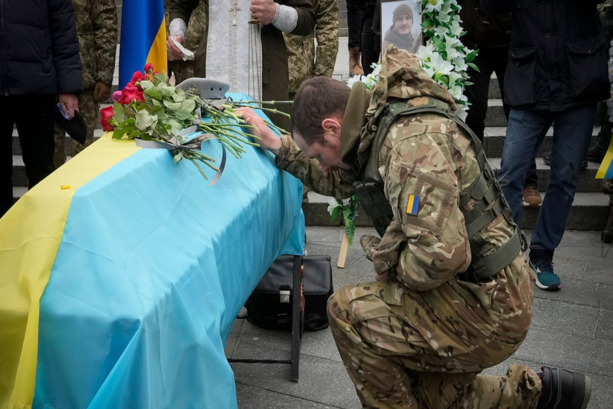 Ukraine returns bodies of 25 dead servicemen