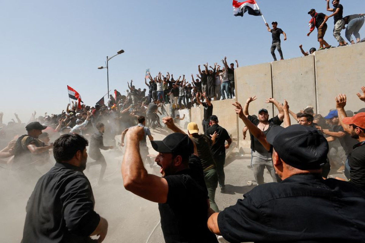 Supporters of Iraqi cleric Sadr storm back into Baghdad