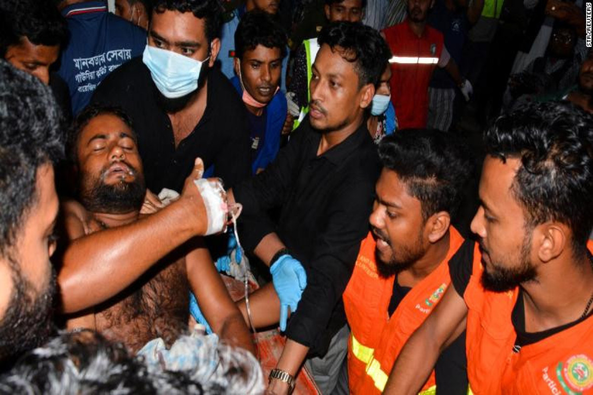 Fire tears through Bangladesh container depot killing 37 and injuring more than 300 -PHOTO 