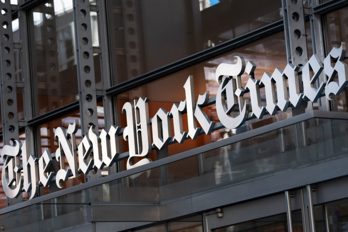 "The New York Times”