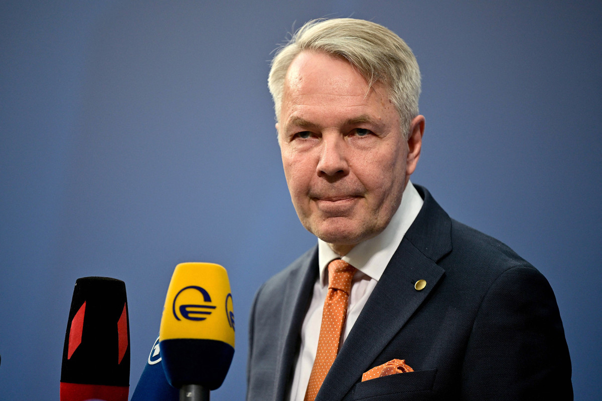 Finnish Foreign Minister Pekka Haavisto speaks to reporters as he arrives for a meeting of NATO foreign ministers on May 14, in Berlin, Germany