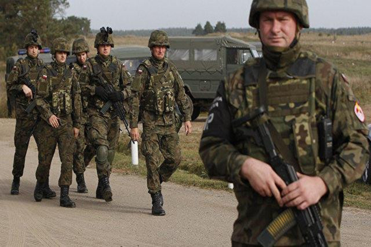 Poland puts military units on heightened readiness, considering NATO Article 4