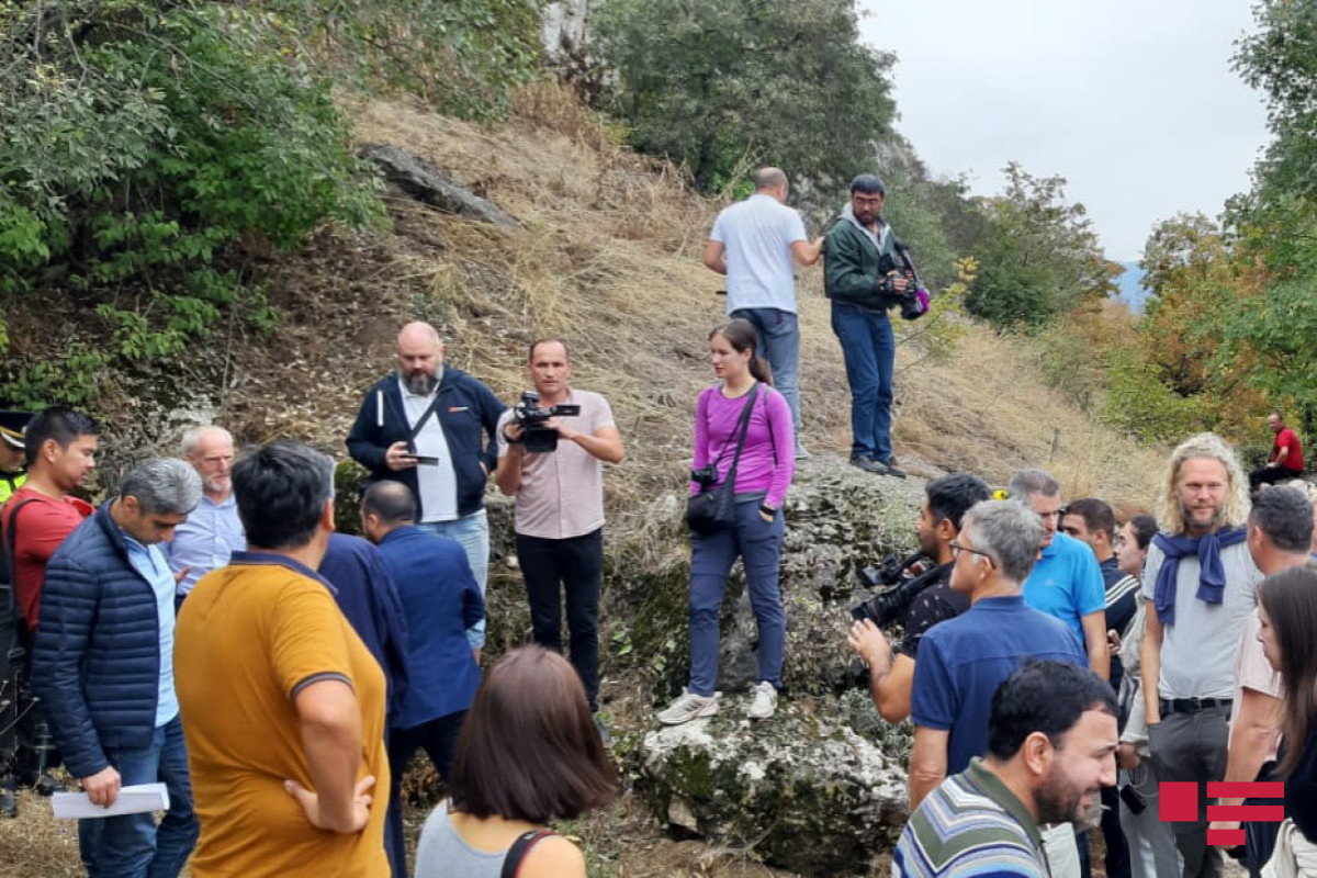 International travelers visit Azykh Cave