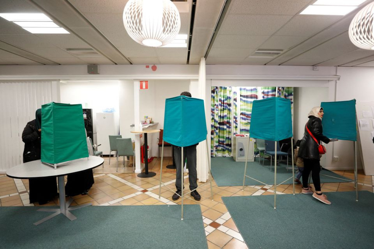 Swedes head to polls in close-run election marked by crime, energy crisis