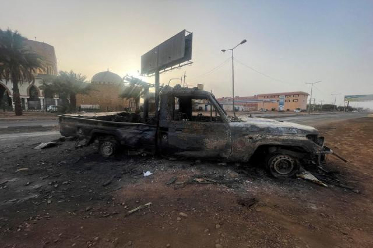 Air strikes hit Khartoum; envoy sees sides more open to talks