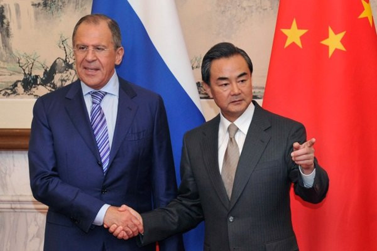 Russian foreign minister Sergey Lavrov, Director of the Office of the Central Foreign Affairs Commission of China, Wang Yi