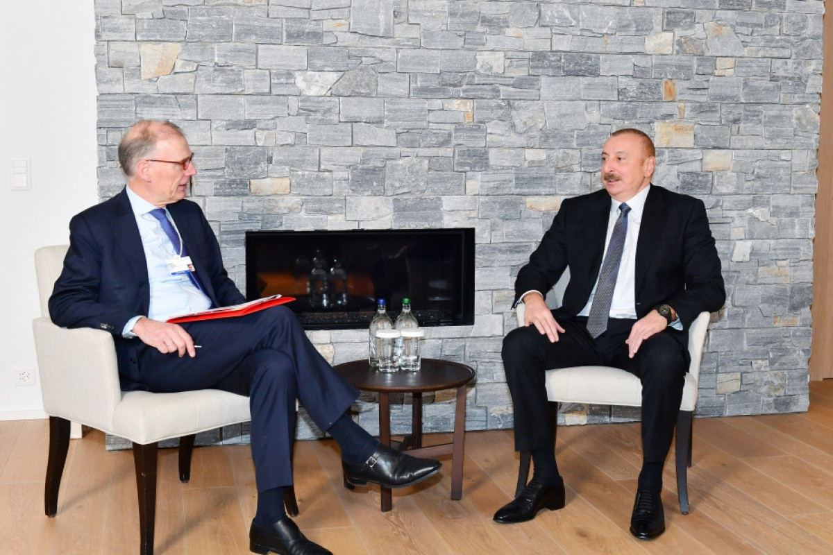 Ilham Aliyev, President of Azerbaijan and President and CEO of Carlsberg Group, Cees