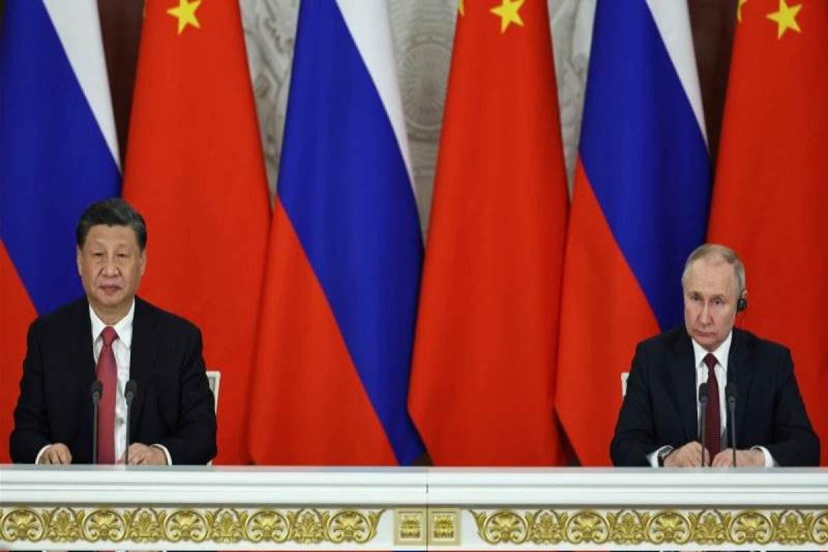 Putin: Xi