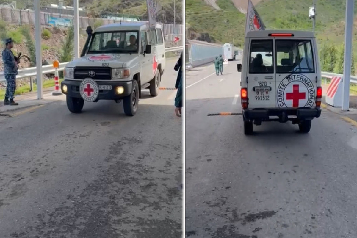 Passing through Lachin border checkpoint ICRC vehicles move to Armenia