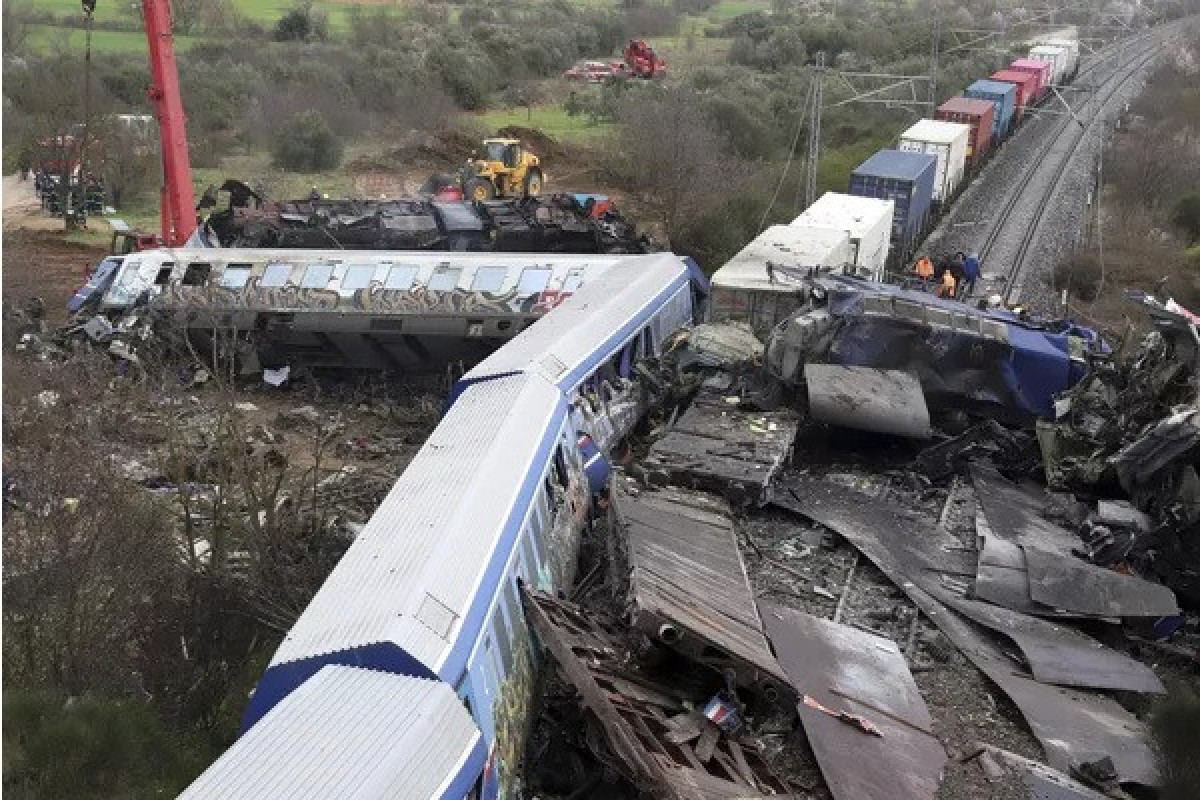 Greek train crash toll rises as rescuers comb through charred wreckage