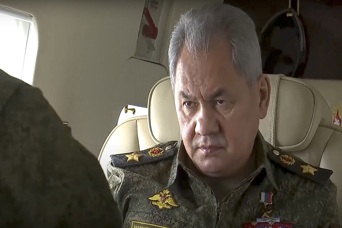 Russian defense minister pays rare visit to troops in Ukraine