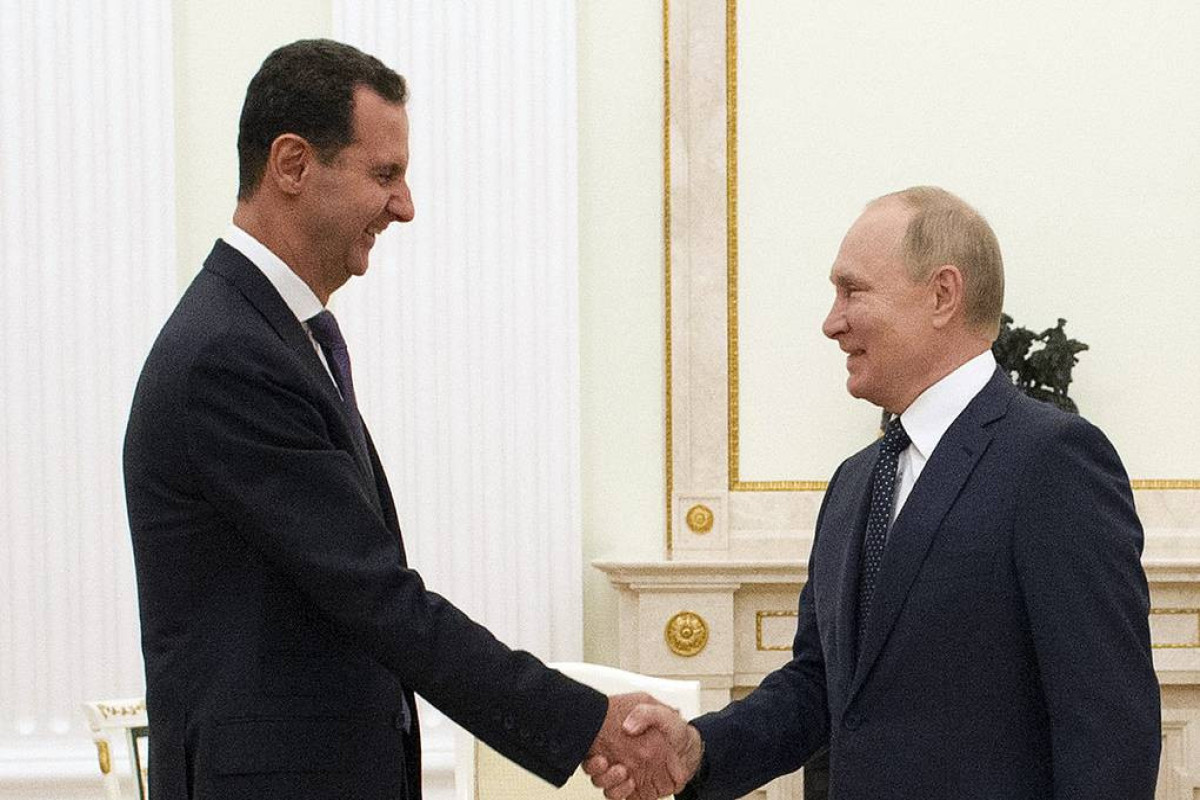 Bashar Assad and Vladimir Putin
