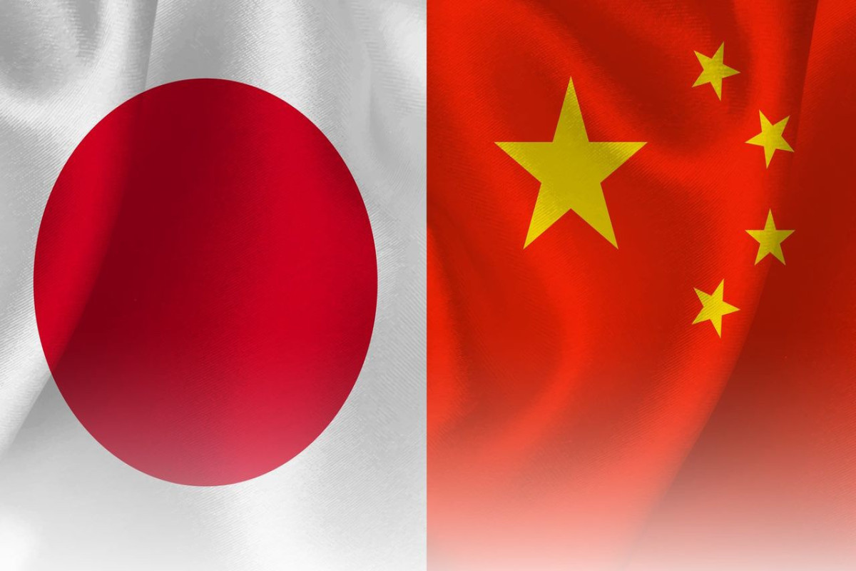 Japan, China ministers make first call on defence hotline