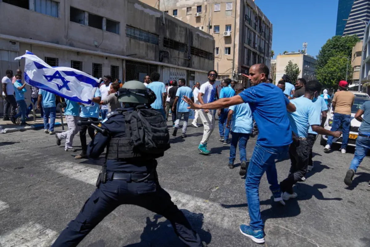 Dozens of people injured in clashes between rival Eritrean groups in Israel