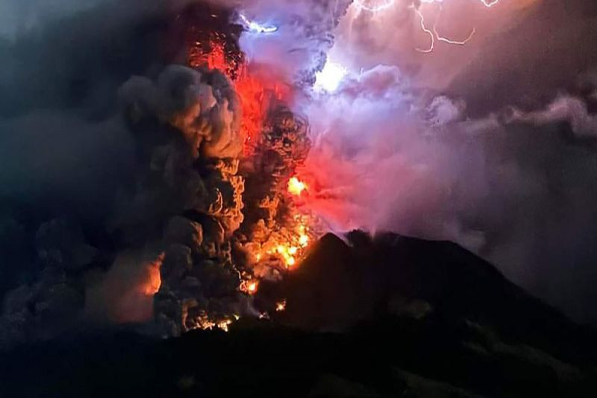 Indonesia issues tsunami alert after volcano erupts on remote island