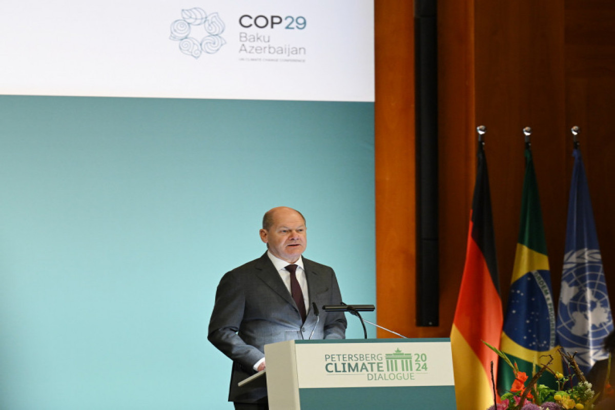 Шольц: Инвестиции в борьбу с изменением климата должны стать глобальными усилиями