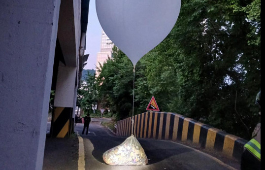 Yonhap: Şimali Koreya Cənubi Koreyaya doğru 240-a yaxın zibil balonu buraxıb