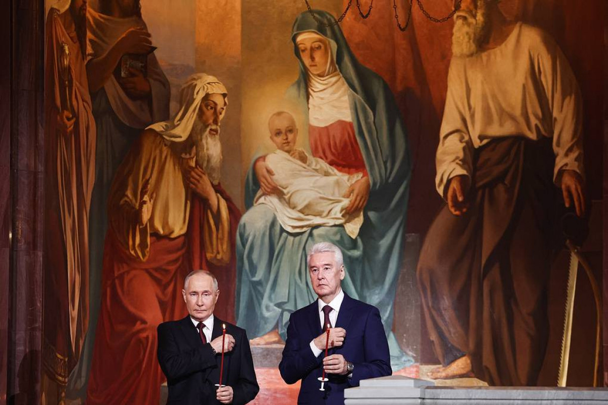 Russian President Putin attends Easter service at Christ the Savior Cathedral