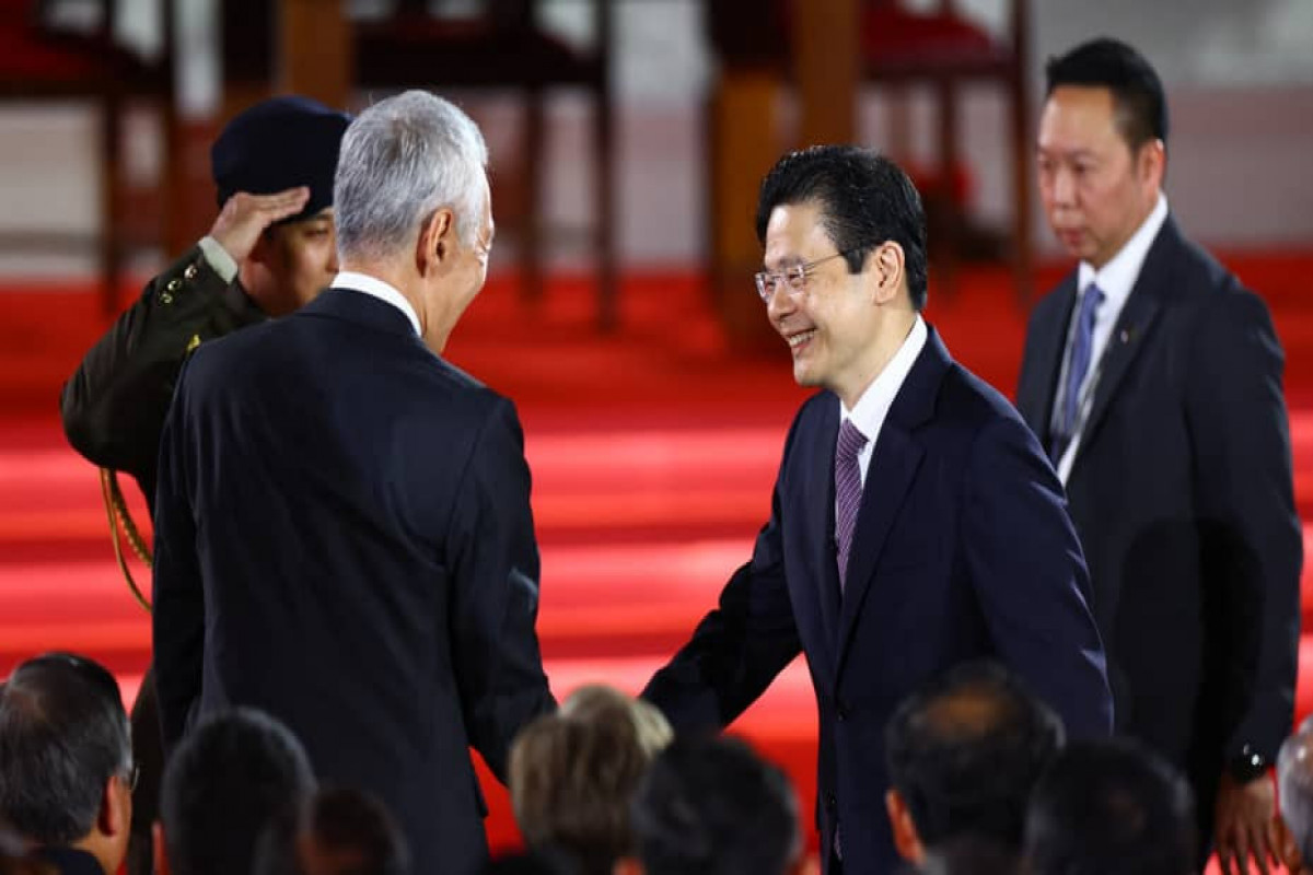 Singapore swears in its first new PM in 2 decades