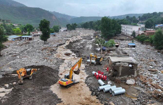 Çində daşqınlar nəticəsində ölənlərin sayı 13 nəfər çatıb