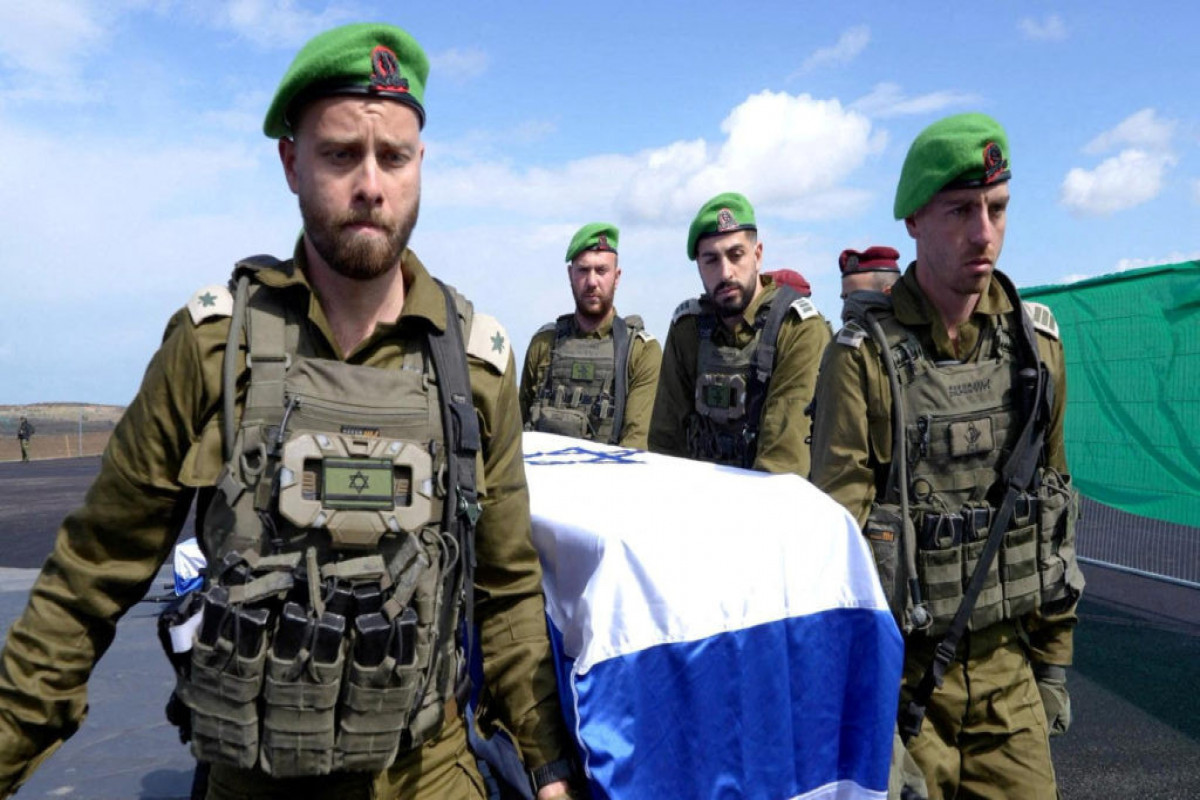 HAMAS israilli girovun meyitini BQXK-ya təhvil verir