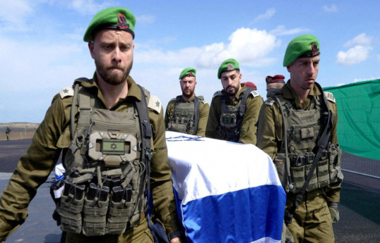 HAMAS israilli girovun meyitini BQXK-ya təhvil verir