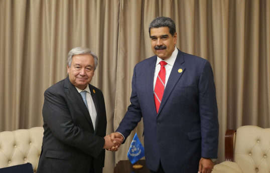 BMT-nin Baş katibi Antonio Quterreş və Venesuela prezidenti Nikolas Maduro