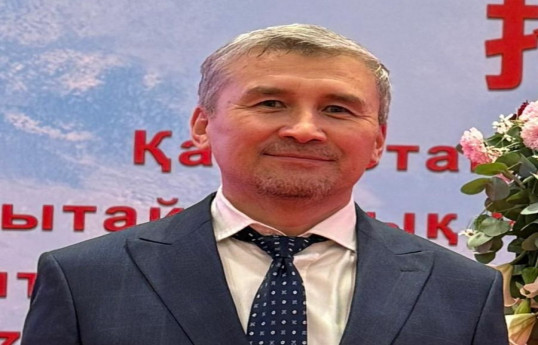 Almat Tokein, Qazaxıstanlı politoloq