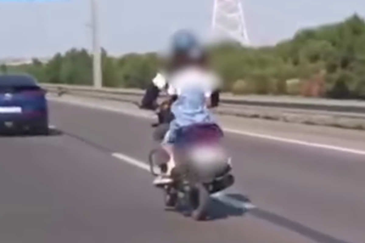 Bakıda övladını təhlükəli şəkildə daşıyan motosiklet sürücüsü saxlanılıb