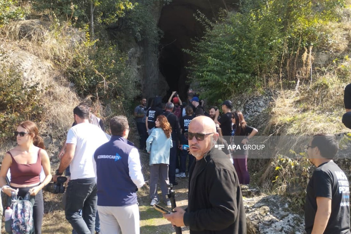 International travelers visit Azykh Cave
