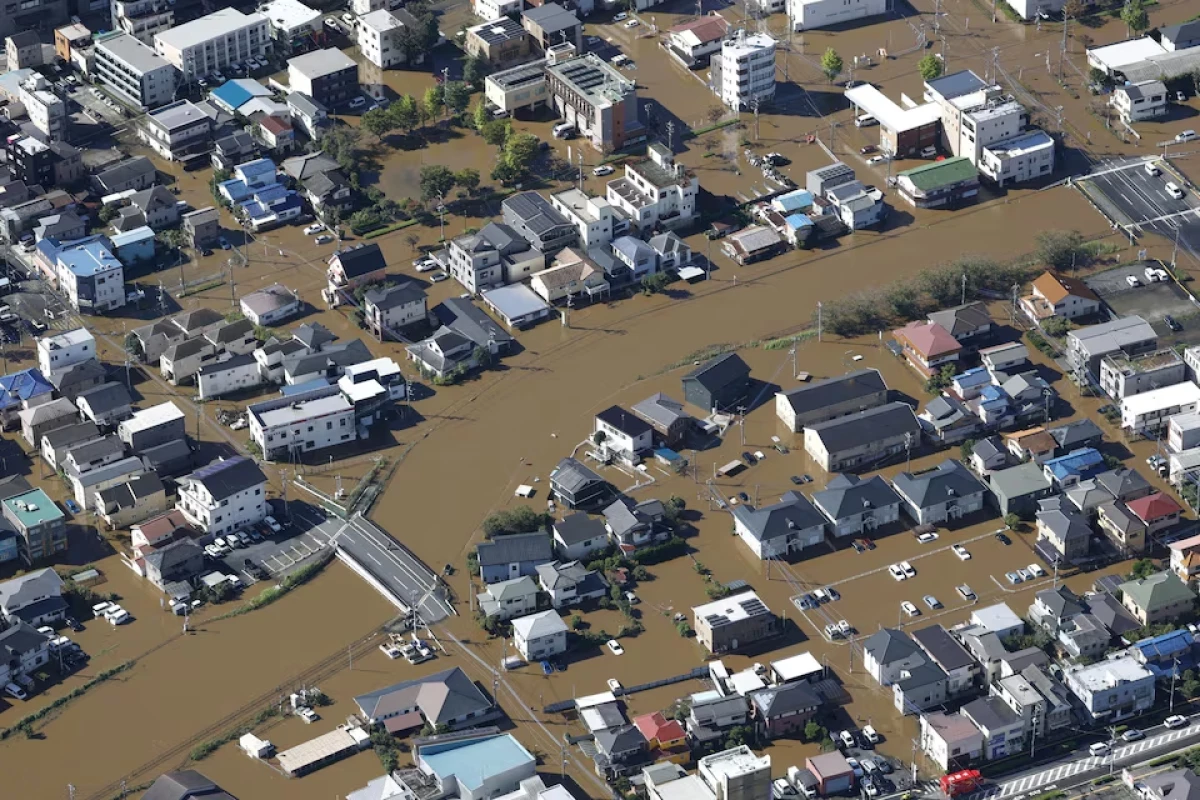 Torrential rains brought by Japan typhoon kill four, NHK says