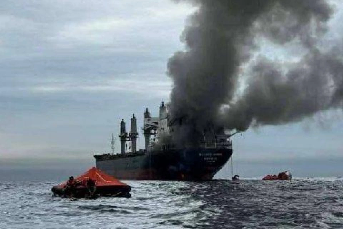 Commercial vessel struck in Strait of Hormuz, catches fire